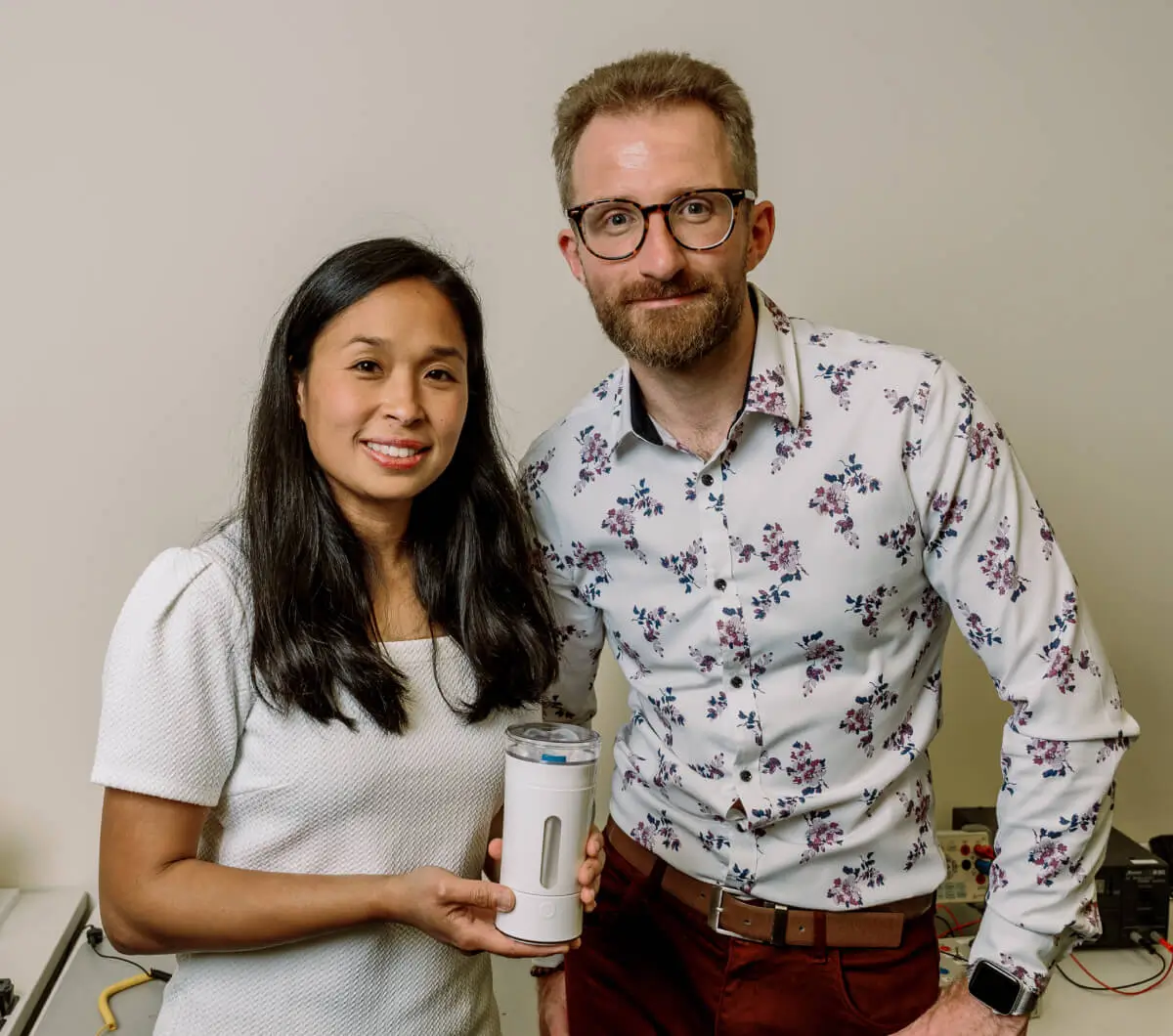 Founders Intan and Matt Holding the Earflo Device