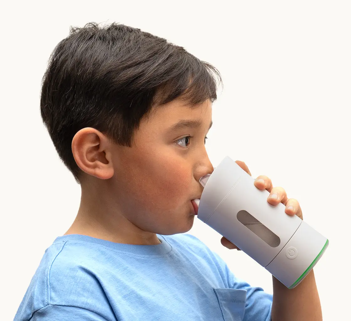 Child Drinking from Earflo Device